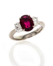 OVAL RUBY AND DIAMOND 3-STONE RING